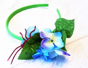 Amongs the pretty blue petal lurks a creepy bug. Bugs in hair happen! Now, it is time to laugh it off with BUGS IN THE HAIR HEAD BANDS! aLL UNIQUE for HEART FELT PLAY STORE. Retail sells excleusivley at Creative Expressions Colorado Springs