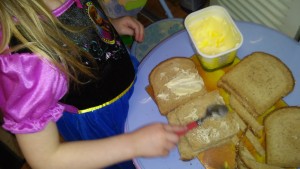 Just an ordinary butter knife or a even a spoon is all that is needed to learn to spread butter on bread.