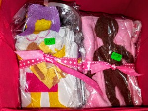 Felt doll sets craft by Malika Bourne the No Non-cents Nanna. Start at $2 to $3. with doll blanket and pillow . Standard sets will come witha random selection of clothes.