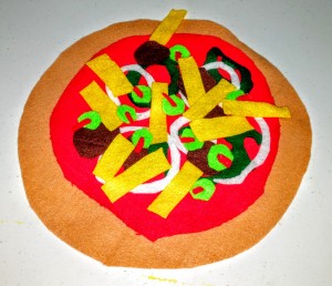 KIds can create their own pizza for pretend. No calories; no salt and non-digestible felt pizza.