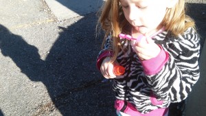 Pre-K kids love generic bottles of bubbles and big shadow ona sidewalk.