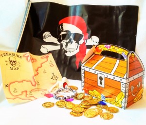 Pirate dramtic play with pirate flag; treasure map; beaded skul bracelette; gold coins; jeweles and treasure box to hold the loot. 