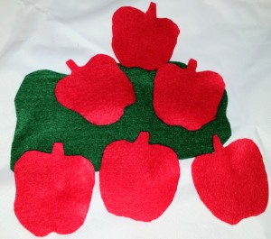 6 red felt apples are great for finger plays and counting.