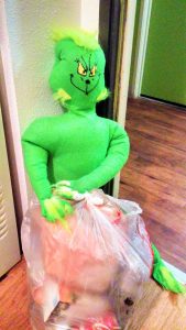 OMG! Short green guy is stealing my trash! He is a Grinch!